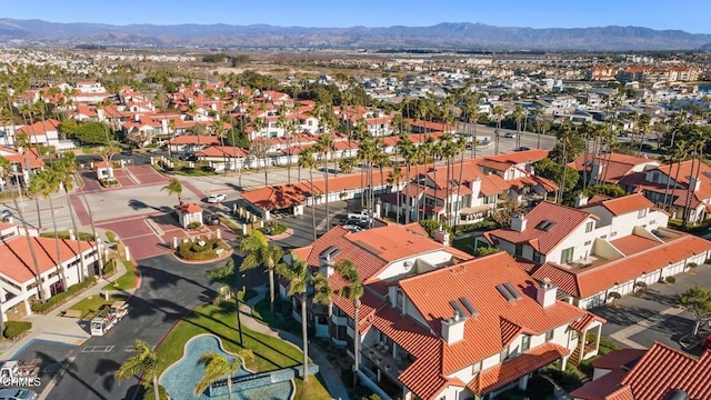 birds eye view of property featuring a residential view and a mountain view