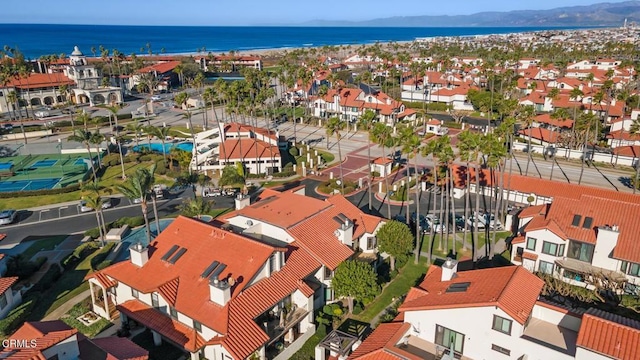 aerial view featuring a residential view and a water view