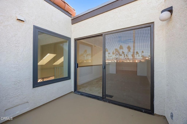 view of patio / terrace featuring visible vents