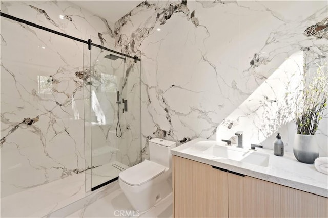 bathroom with walk in shower, vanity, tile walls, and toilet