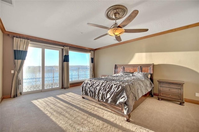 bedroom with ceiling fan, light carpet, access to exterior, and ornamental molding