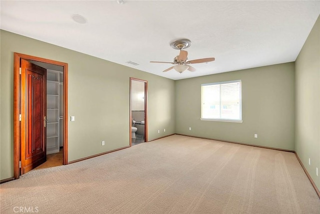 27008 Reef Ln, Helendale, CA 92342 - empty room featuring a ceiling fan, baseboards, and light carpet