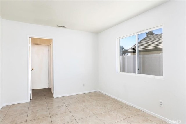 view of tiled empty room