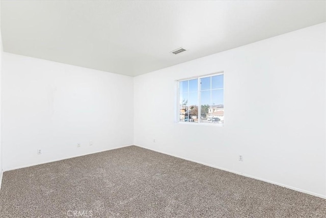 view of carpeted spare room