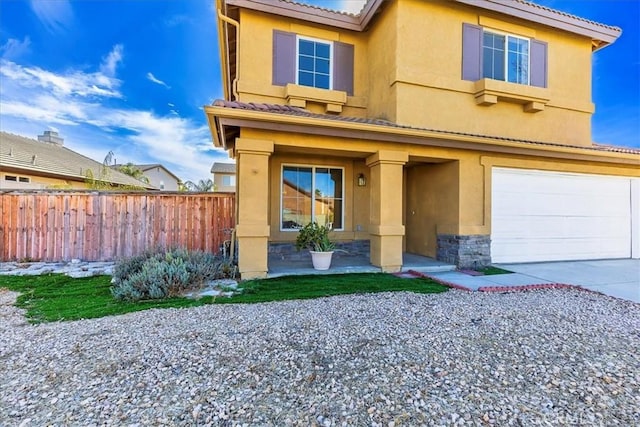 view of property featuring a garage