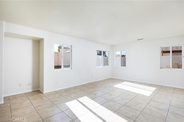 view of tiled spare room