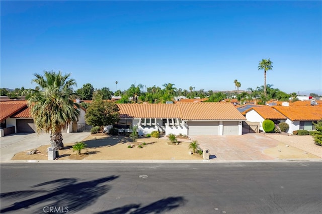 view of front of home featuring a garage