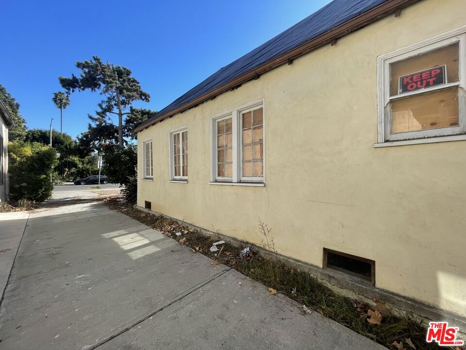 view of side of home with a patio area