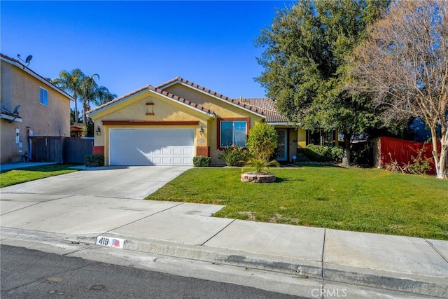 single story home with a front yard and a garage