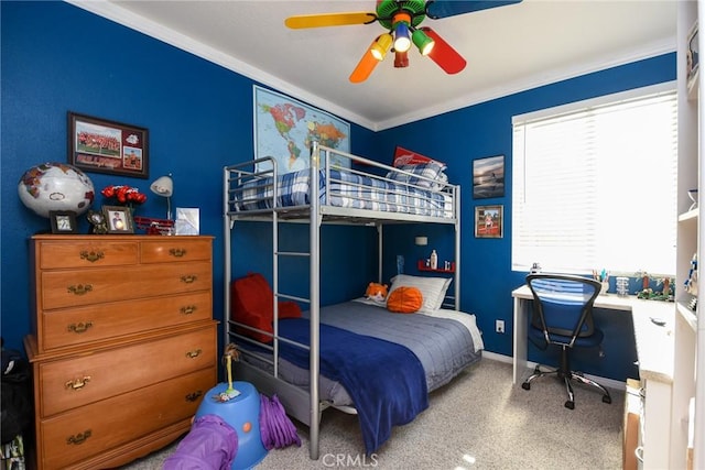 bedroom with ceiling fan and ornamental molding