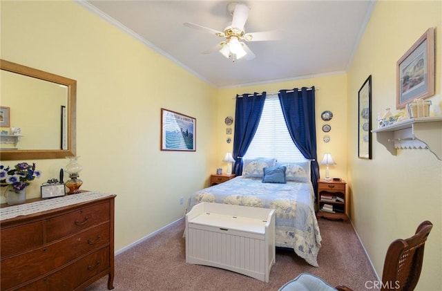 carpeted bedroom with ceiling fan and ornamental molding