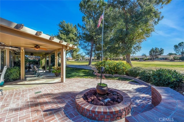 view of patio / terrace featuring ceiling fan