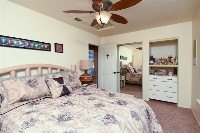 carpeted bedroom with ceiling fan