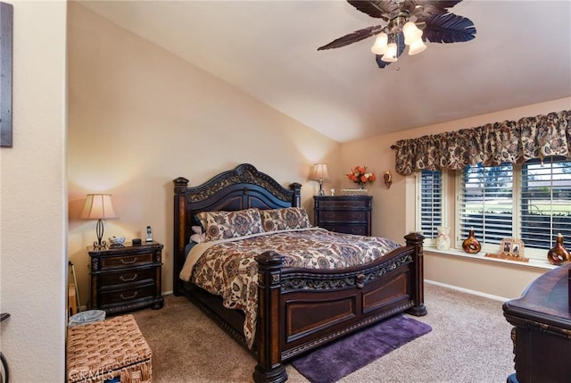 carpeted bedroom featuring vaulted ceiling and ceiling fan