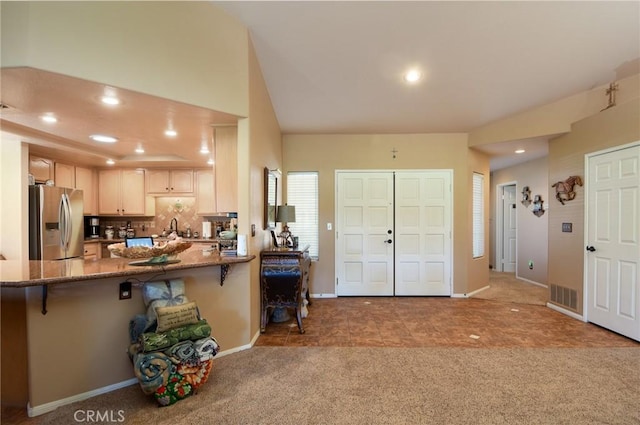 foyer featuring carpet floors and sink