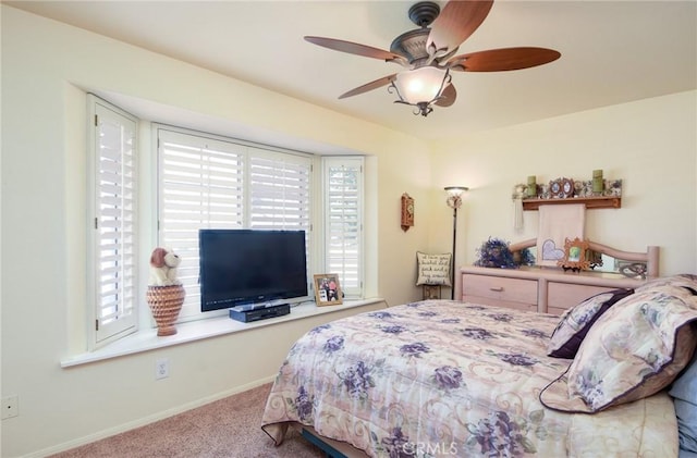 bedroom featuring ceiling fan and carpet flooring