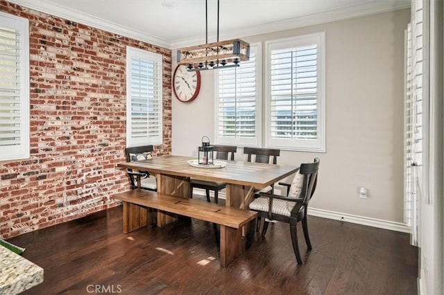 dining area featuring brick wall, dark hardwood / wood-style floors, and ornamental molding