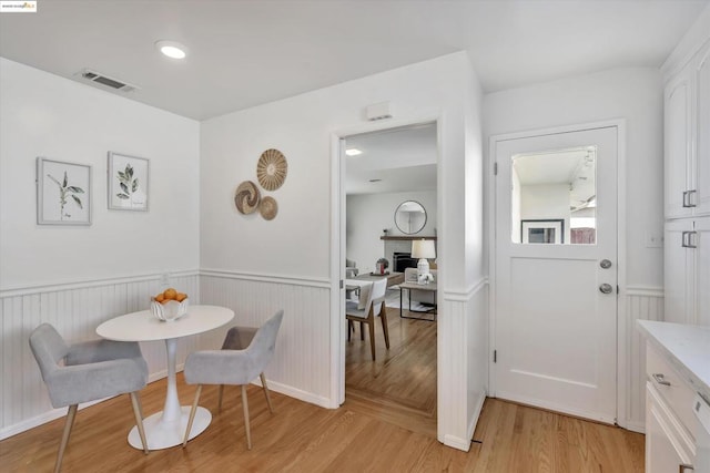 dining area featuring light hardwood / wood-style flooring and breakfast area