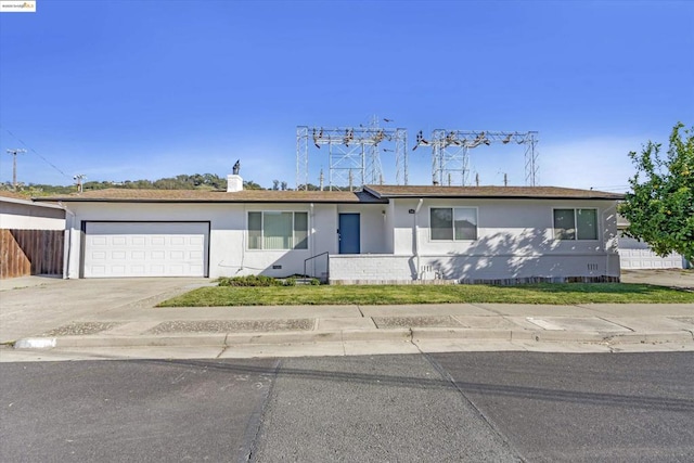 single story home with a garage