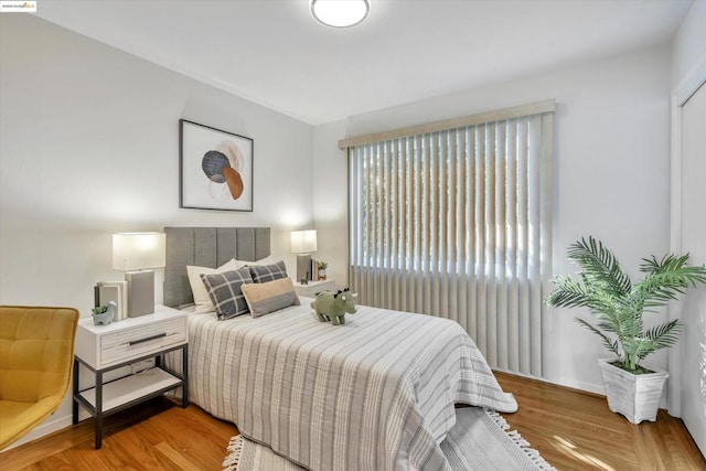 bedroom featuring light hardwood / wood-style floors