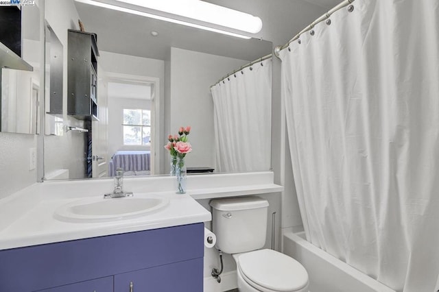 full bathroom featuring toilet, vanity, and shower / tub combo with curtain