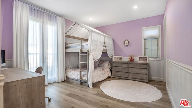 bedroom featuring light wood-type flooring