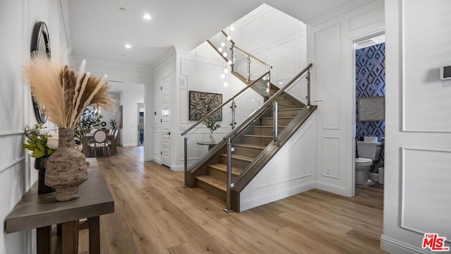 stairway with wood-type flooring