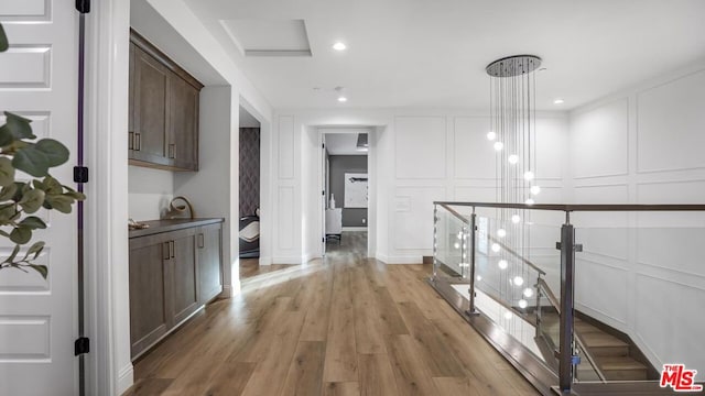 corridor featuring light hardwood / wood-style floors