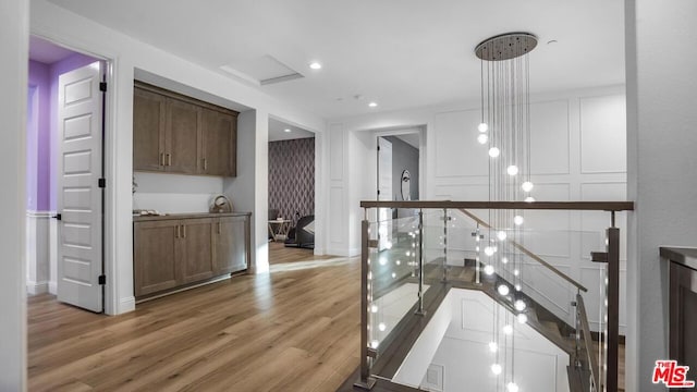 hallway featuring light hardwood / wood-style flooring