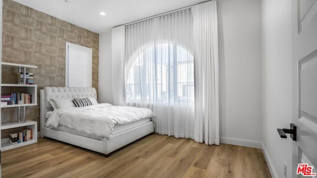 bedroom featuring light hardwood / wood-style flooring