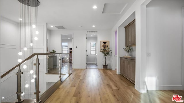 corridor featuring light hardwood / wood-style floors