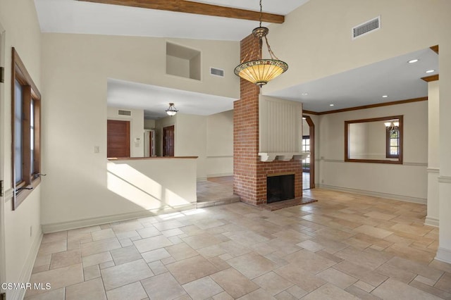 unfurnished living room with beam ceiling, a brick fireplace, and high vaulted ceiling