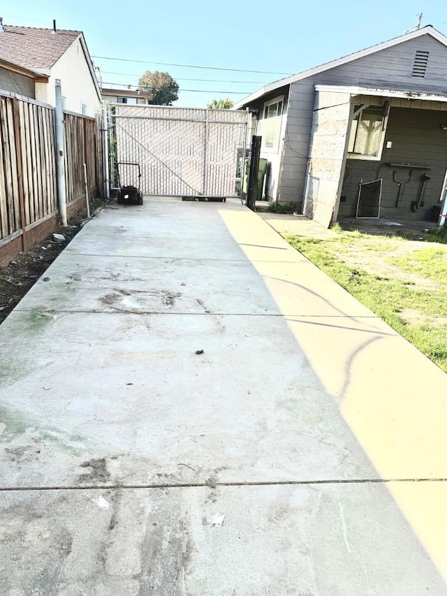 view of side of home with a lawn