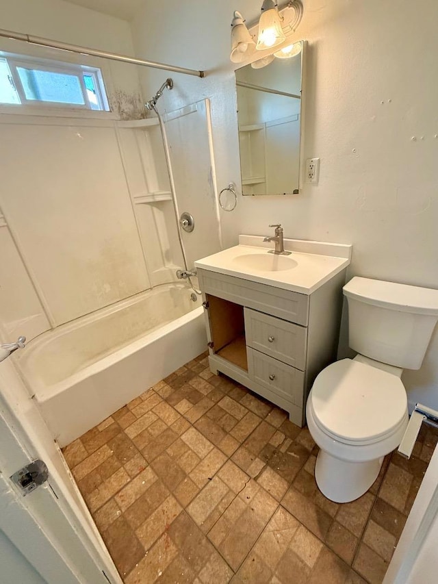 full bathroom featuring toilet, vanity, and bathing tub / shower combination