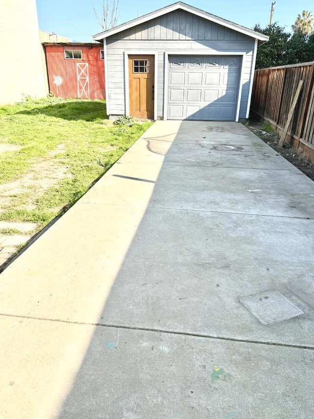 garage featuring a yard