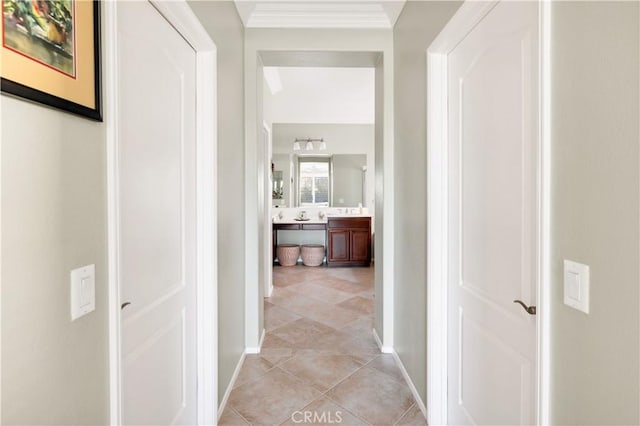 hallway featuring light tile patterned floors