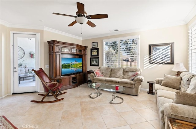 living room featuring ornamental molding, light tile patterned floors, and ceiling fan