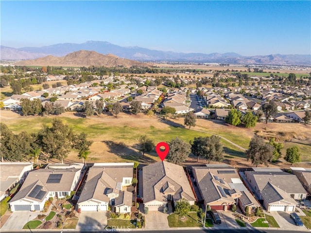 drone / aerial view featuring a mountain view