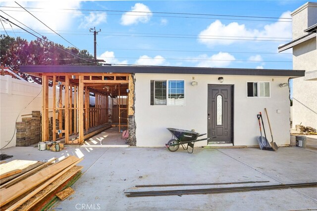 view of front of property with a patio