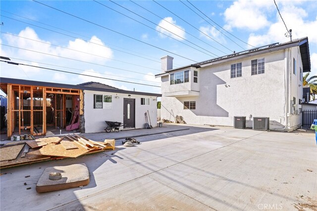 rear view of property with a patio