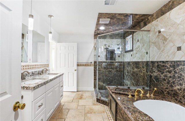 bathroom with plus walk in shower and vanity