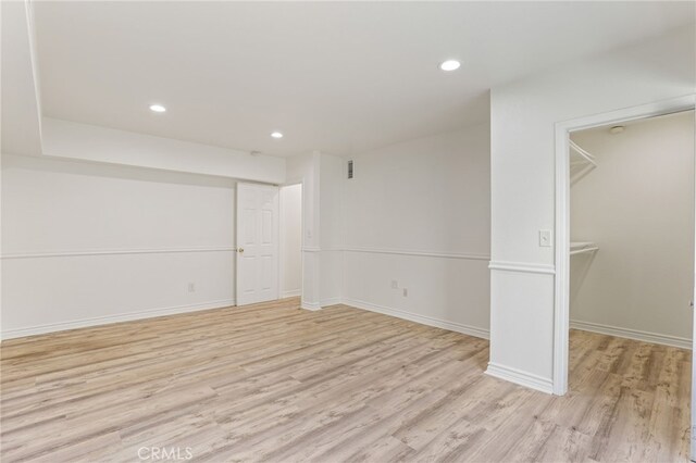 unfurnished room featuring light hardwood / wood-style floors