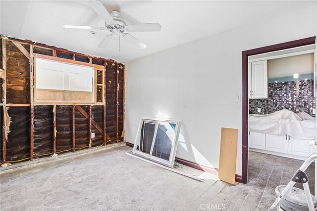 interior space with ceiling fan and hardwood / wood-style floors