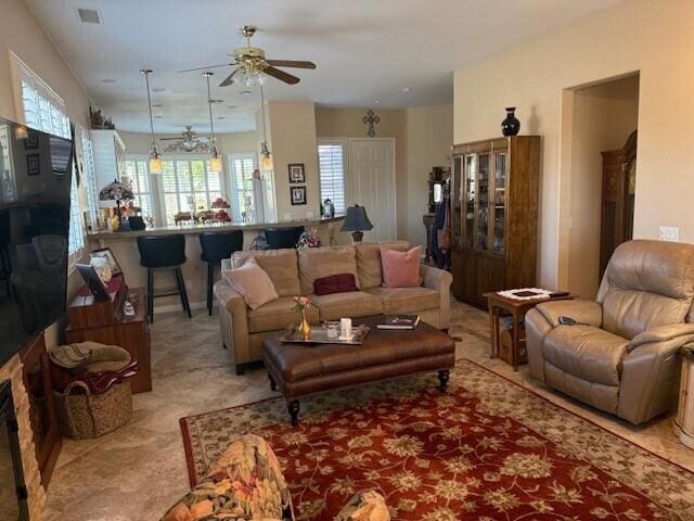 living room featuring ceiling fan