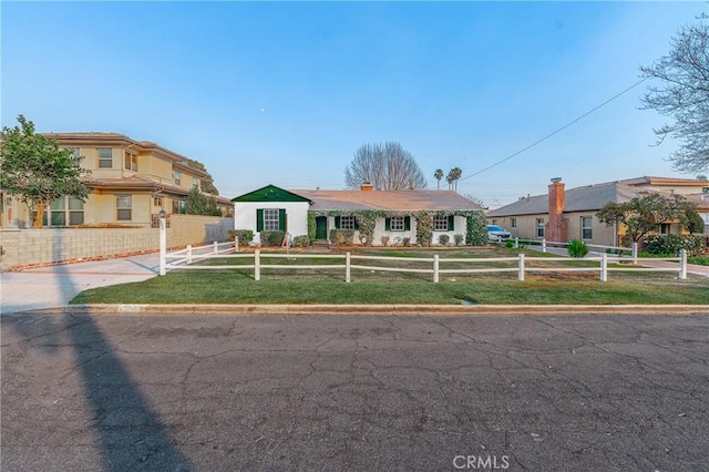 view of front of home with a front yard