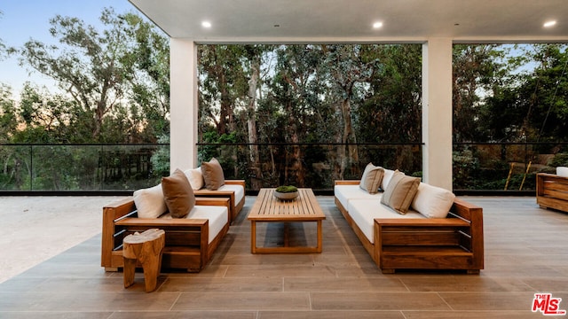 patio terrace at dusk with an outdoor hangout area