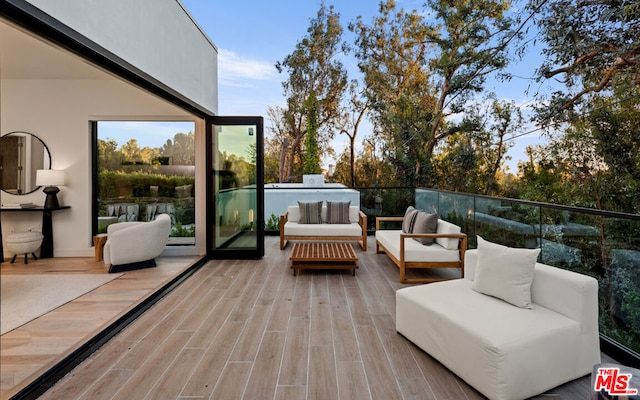 deck with an outdoor hangout area