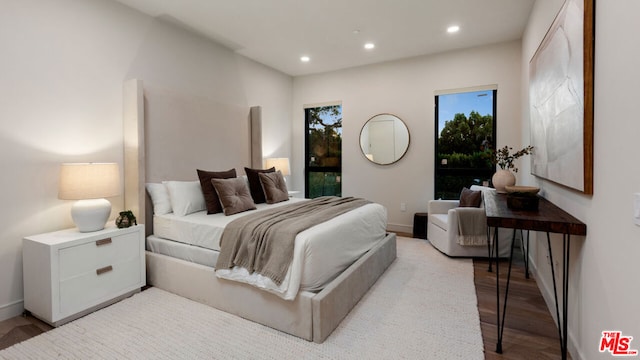 bedroom featuring light wood-type flooring