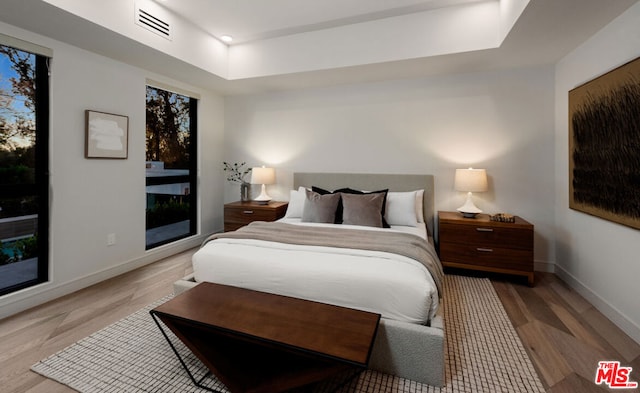 bedroom featuring light hardwood / wood-style floors