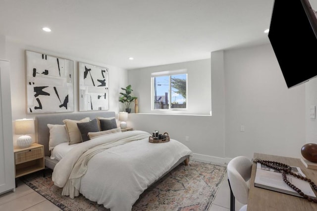 bedroom with light tile patterned flooring